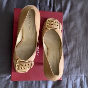 Slightly worn nude pumps